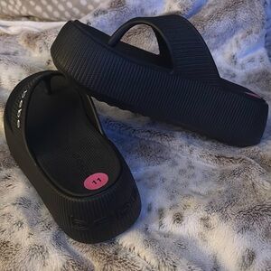 New BeBe sandals, never worn.